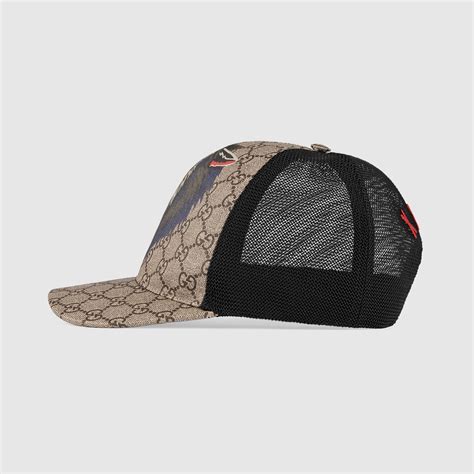 gucci 426887|Gucci Cappellino da baseball in tessuto GG Supreme con lupo.